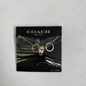 Coach Silver-Tone Layered Necklace with Ring and Cylinder Charms